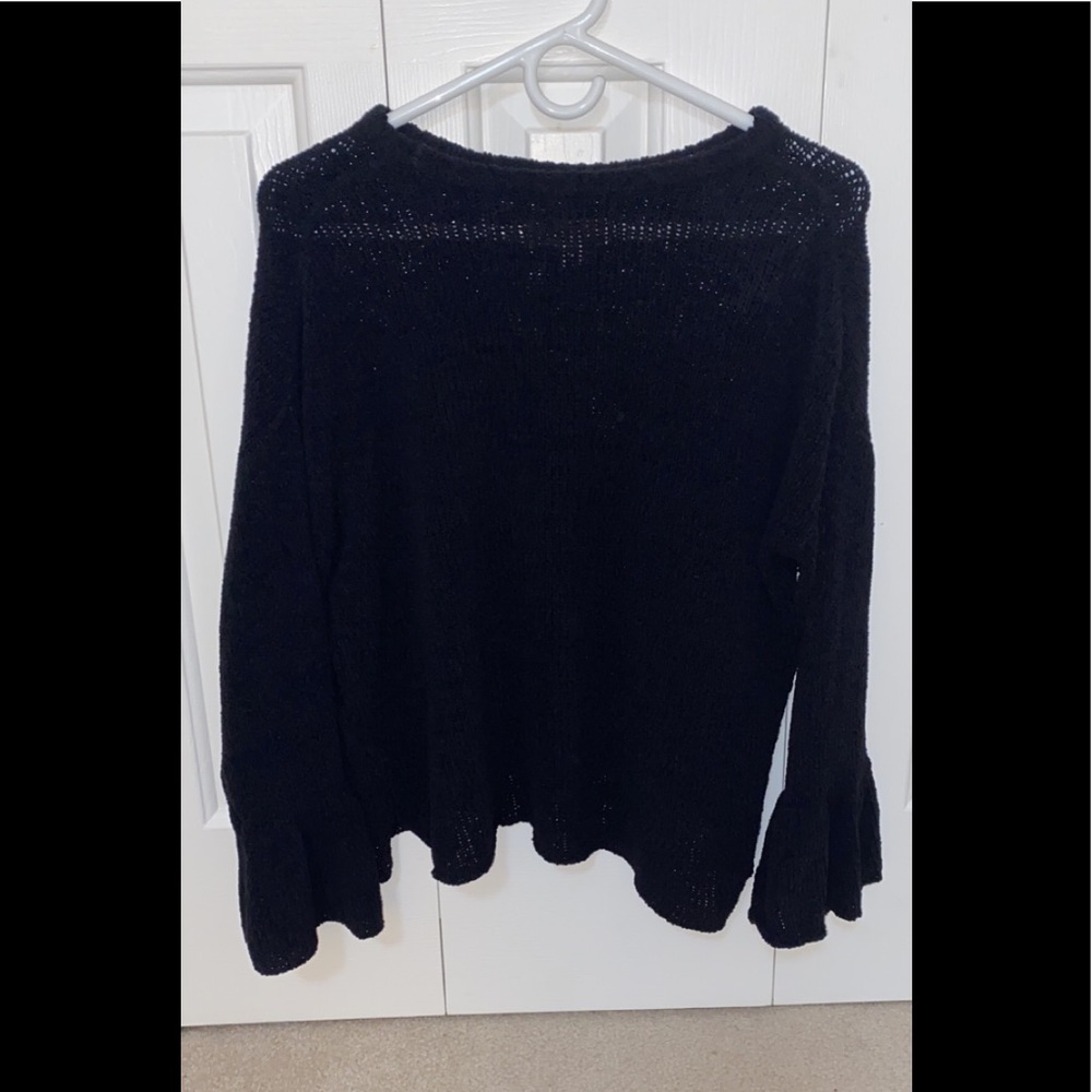 black long sleeve with flared sleeves